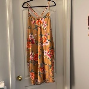 Peachy tan floral dress with the criss cross straps by Love Chesley in 2X